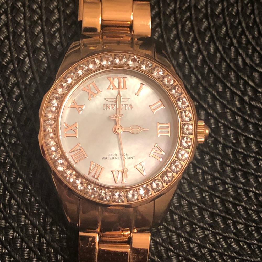 Gold Invicta Watch..